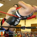 Xander Page and Dr. Lamar Braxton Porter battle in the corner during the battle royal.